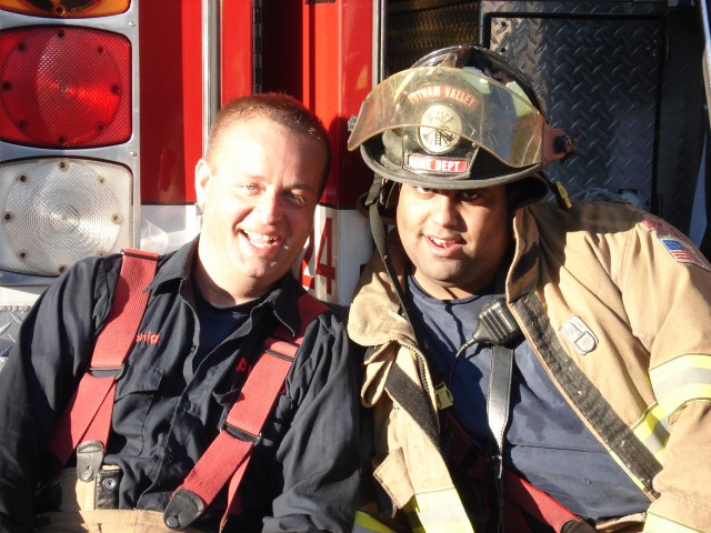 Deputy Chief Koenig and Firefighter Vanhorn pose for a picture after a long day of training